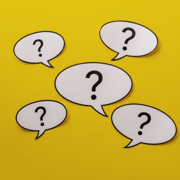 credit monitoring service truecredit question marks on yellow background